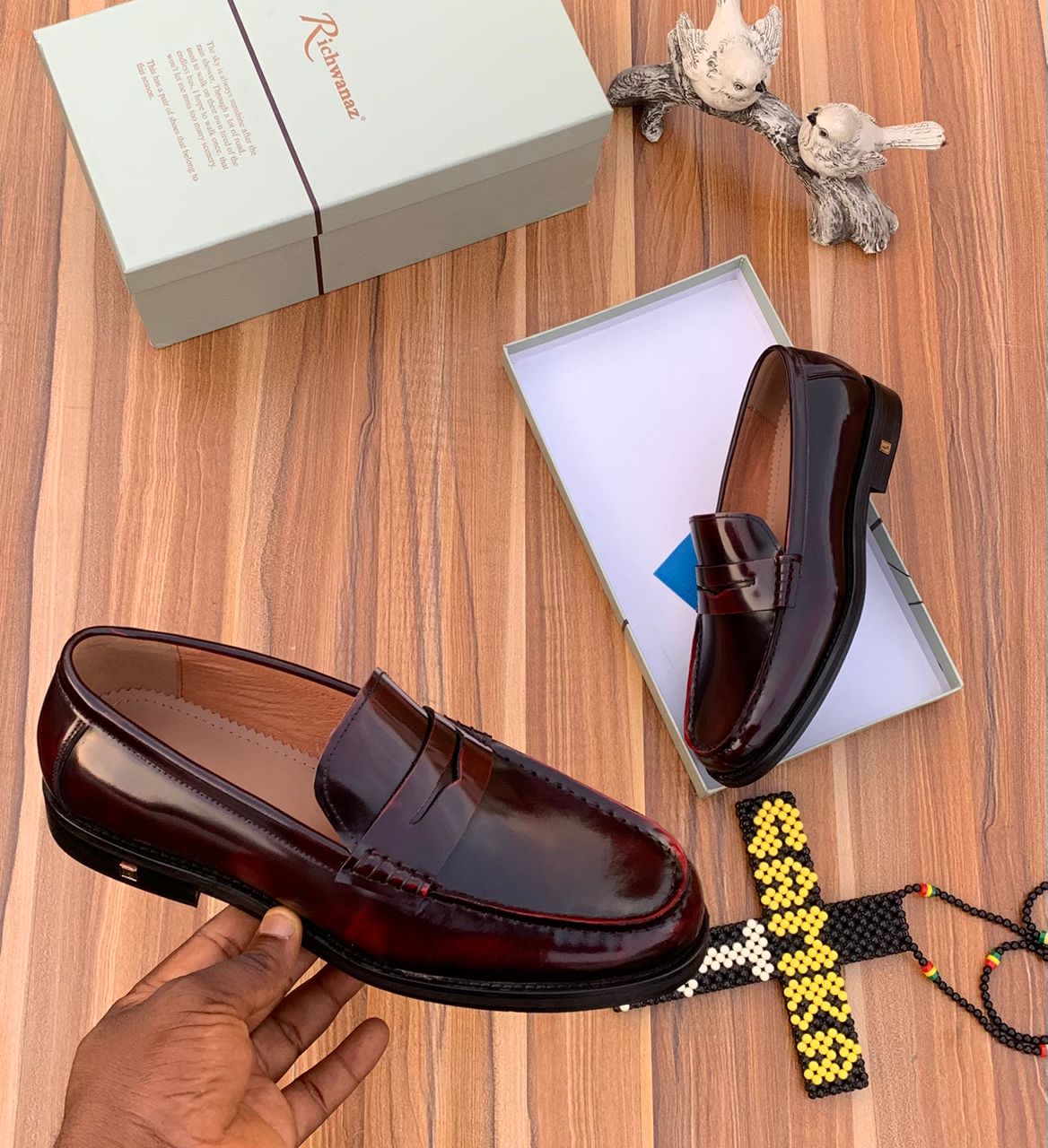 Add timeless sophistication to your footwear collection with these hi-shine burgundy leather penny loafers, inspired by classic European craftsmanship. Crafted from polished leather with a rich burgundy finish, these men’s loafers feature a traditional penny strap and a sleek silhouette that delivers elegance, versatility, and refined appeal. Perfect for business wear, formal occasions, weddings, and elevated smart-casual looks, these classic penny loafers offer comfort and enduring style. Shop premium men’s leather shoes at SplendourMan, your trusted destination for refined footwear in Lagos and Abuja, with fast and reliable nationwide delivery across Nigeria.